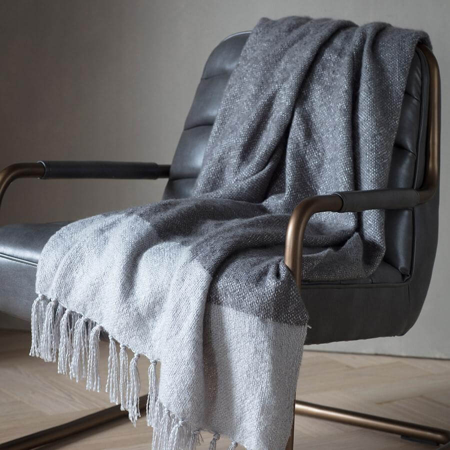 Fringed dark grey and silver throw