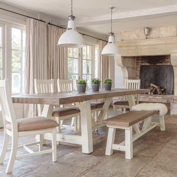 modern farmhouse dining table 2m with both ends extended, 5 x chairs and 1 x bench- in light room with large windows and fireplace