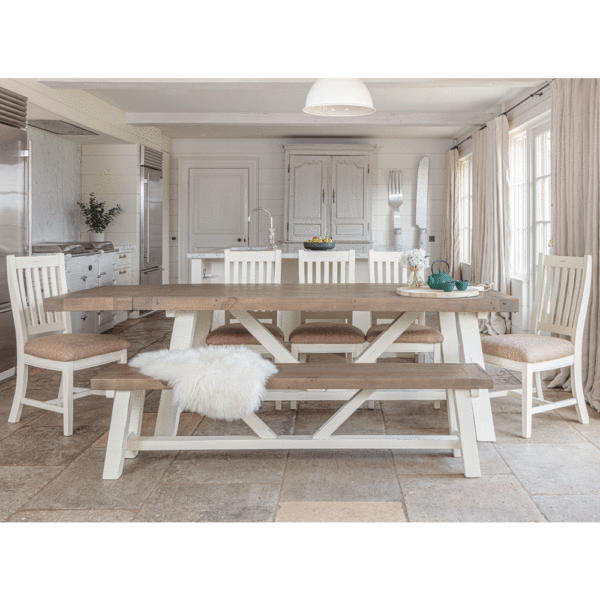 modern farmhouse dining table 2m with left side extended surrounded by 5 x chairs and bench in the foreground- in white rustic kitchen setting