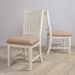 2 x modern farmhouse chairs on pale wooden floor