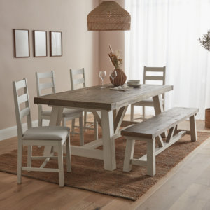Modern Farmhouse ladder back dining chairs with fabric seats placed on a wooden floor