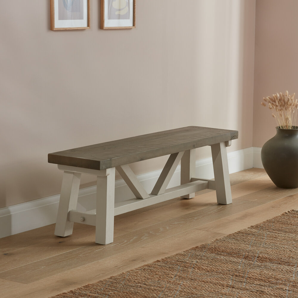 Modern Farmhouse bench placed in a wooden hallway next to an ornamental vase