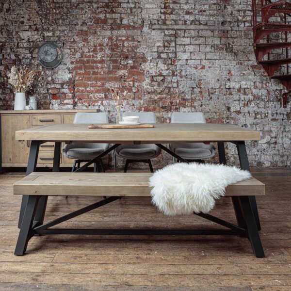 INdustrual style dining table, part of the urban range, with matching bench and light grey dining chairs