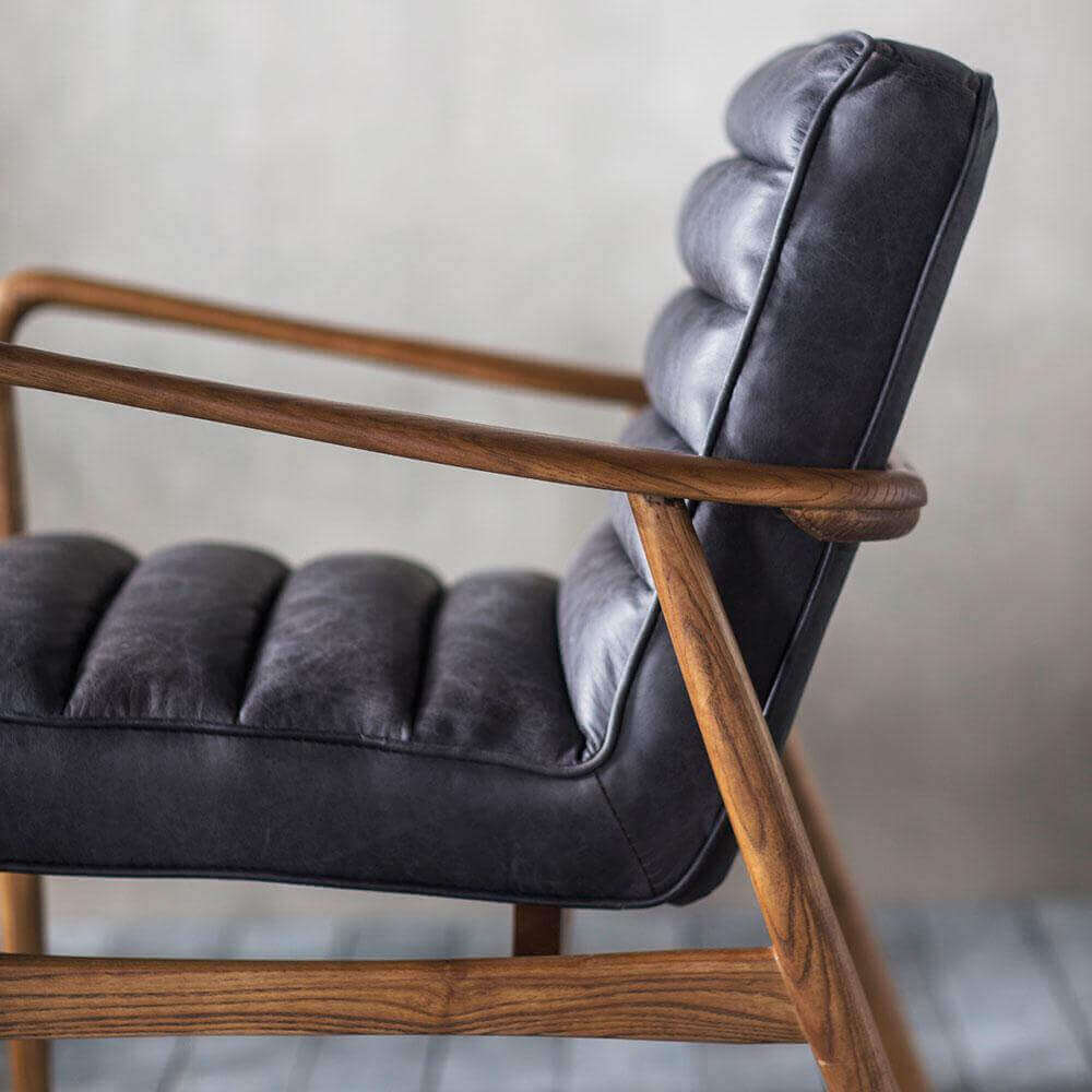 Datsun leather armchair antique ebony