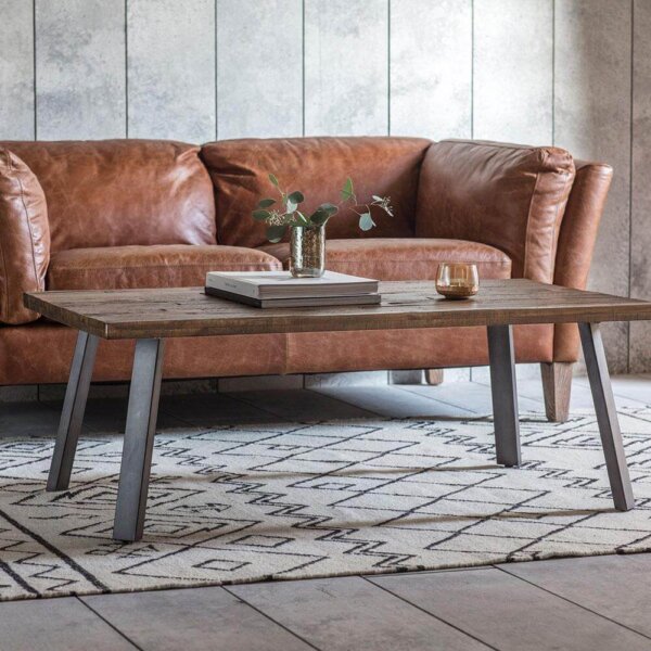 The Loft Coffee Table placed on a patterned rug