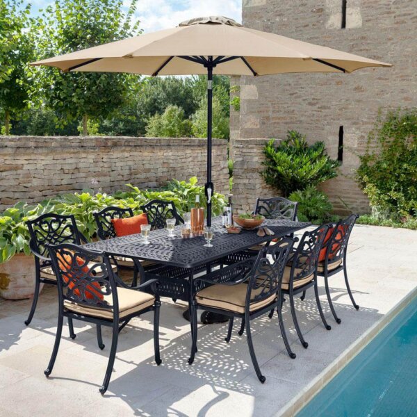2019 Hartman Capri 8 Seat Rectangular Garden Dining Table Set in bronze/ amber next to pool with parasol up