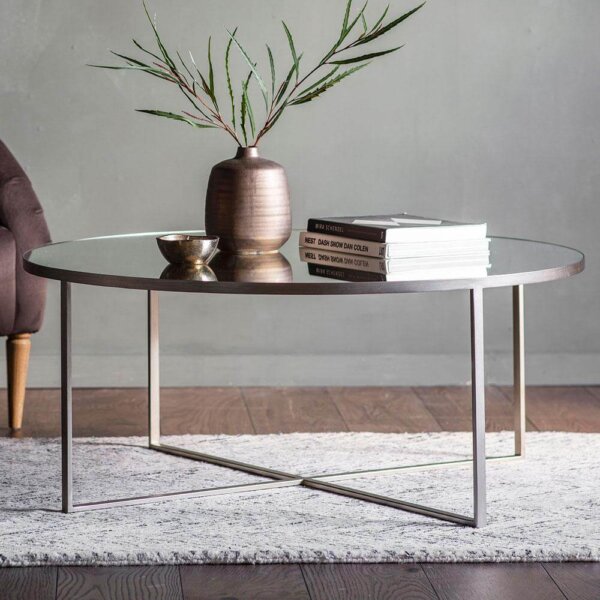 Brennan Coffee Table in silver with books, vase and ornaments on top