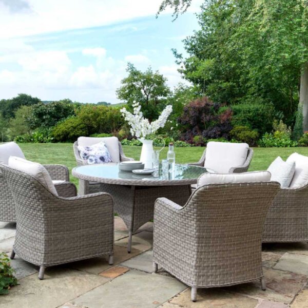 Kettler Charlbury Dining Table with Glass Table top and 6 Dining chairs on a Patio