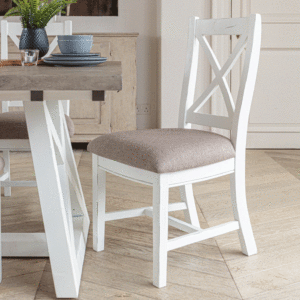 close up of white and grey dining chair next to matching table