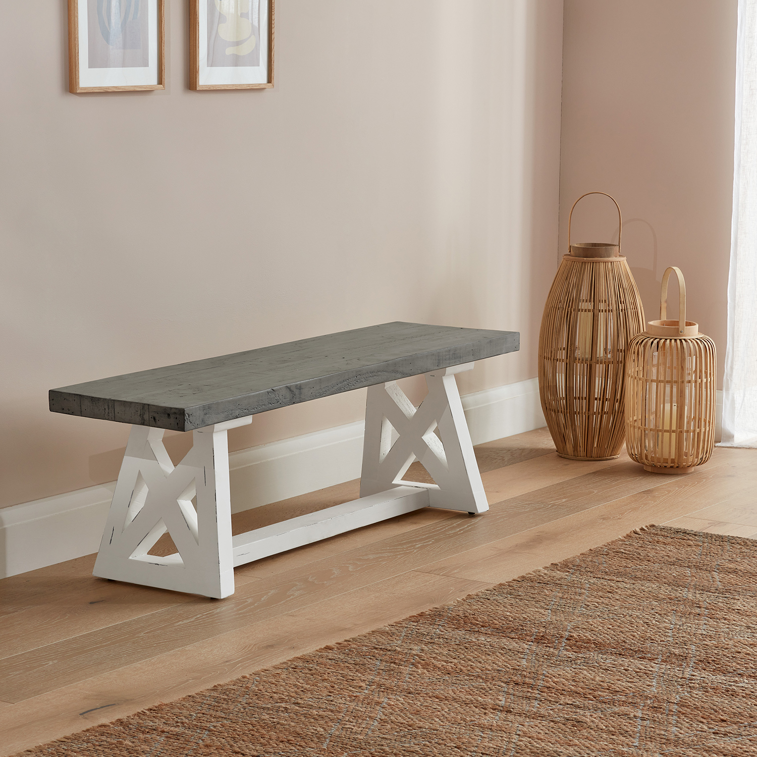 White and Grey small dining bench placed in a wooden hallway with ornamental wicker lanterns placed next to it