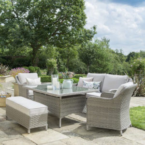 2020 Kettler Charlbury casual dining 6 seat garden dining sofa set in garden setting