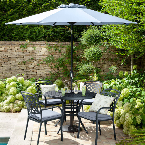 2021 Hartman Berkeley 4 seat garden dining set with round table. on garden patio with parasol