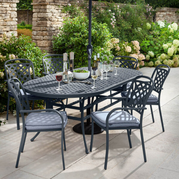 2020 Hartman Berkeley 6 seat garden dining set with oval table- antique grey/ platinum. On garden patio with wine bottles and glasses on table