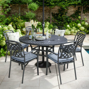 2020 Hartman Berekley 6 seat garden dining set with round table- antique/platinum. Set on garden patio with table set with plates and wine glasses