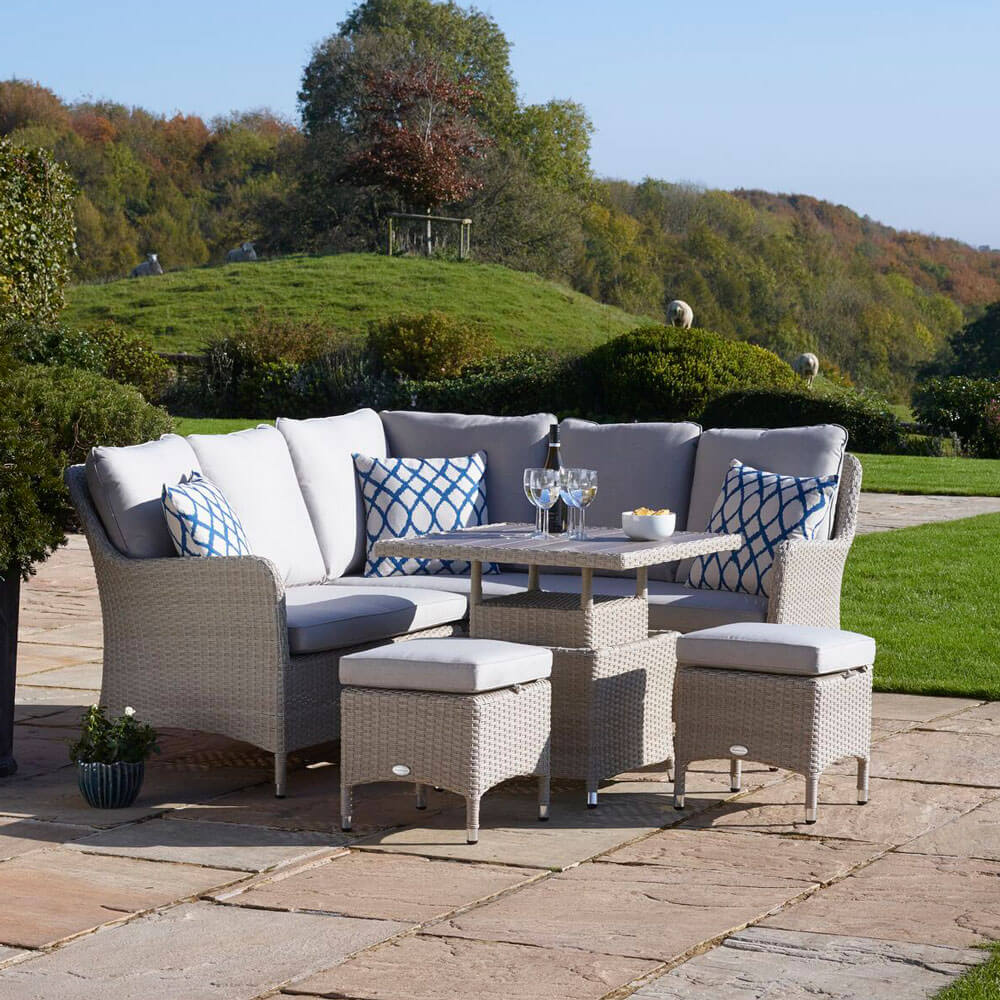 2021 Bramblecrest Tetbury Garden Sofa Set With Mini Adjustable Tree-Free Table & 2 Stools on a garden patio with the table risen