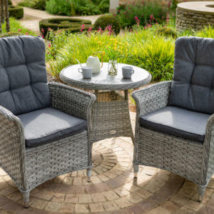 Heritage garden bistro set with 2 x chairs and 1 table on round stone patio in garden