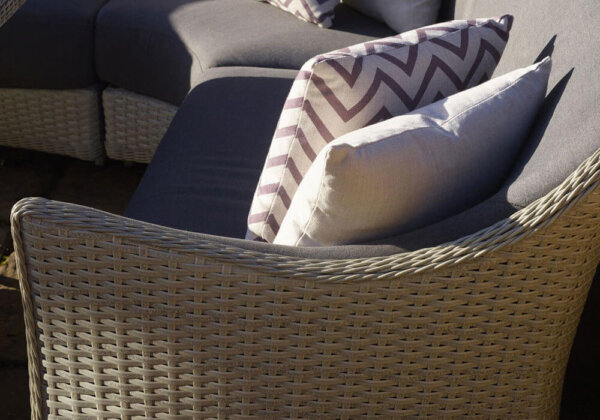 close up of chevron cocoa square scatter cushion on outdoor chair