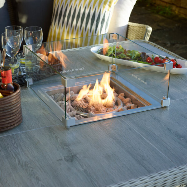fire_pit_dining_table_close_up_with_food_dishes
