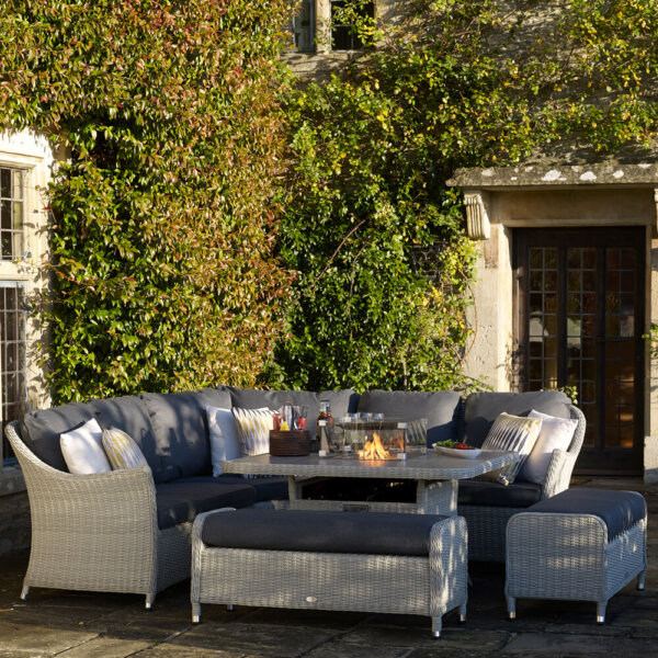 2021 Bramblecrest Monterey Sofa Set with Square Firepit Dining Table in Ivy Covered courtyard
