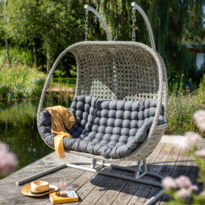 double_hanging_egg_chair_on_decking