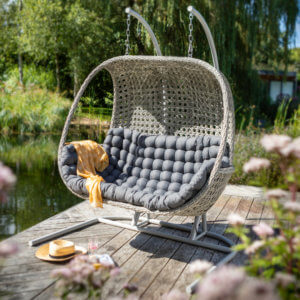double_hanging_egg_chair_on_decking