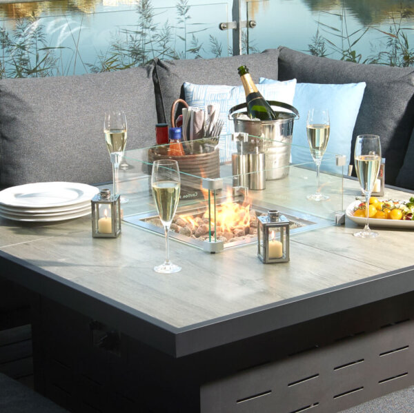 Fire_Pit_Integrated_Into_Dining_table_With_Champagne_Bucket