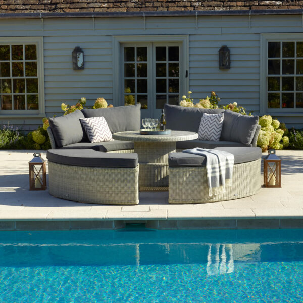 Grey_Circular_Garden_Furniture_Set_With_Table_With_Swimming_Pool_In_Foreground