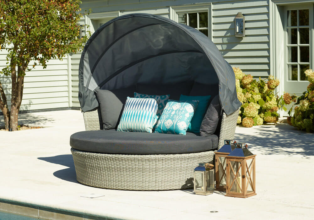2021 Bramblecrest Monterey Daybed with Canopy in Dove Grey Next To A Pool