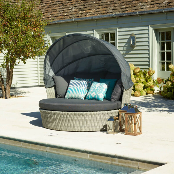 2021 Bramblecrest Monterey Daybed with Canopy in Dove Grey Next To A Pool