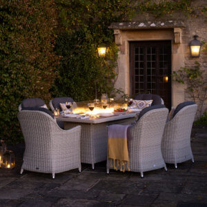 Grey_Garden_furniture_With_fire_Pit_In_Dusky_Light_in_courtyard
