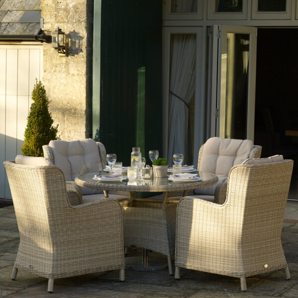 4_chair_round_furniture_set_on_patio_partially_sunlit