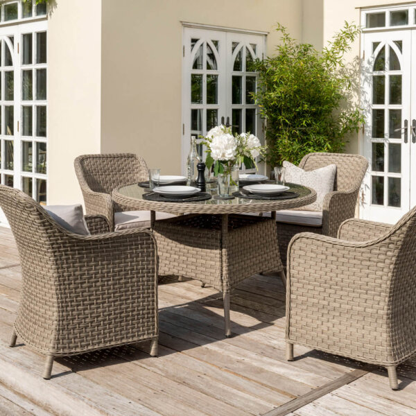 garden_furniture_sat_on_decking_with_fully_made_table