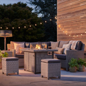 Kettler Palma Mini Firepit garden table set in an outdoor setting at dusk