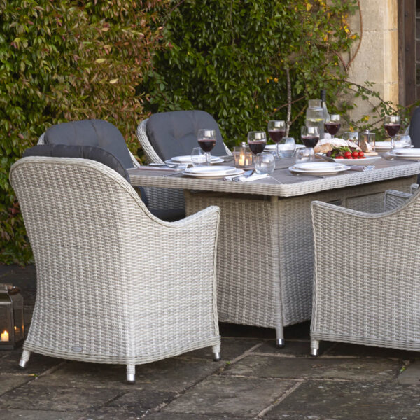 close_up_of_garden_furniture_in_courtyard_with_made_table