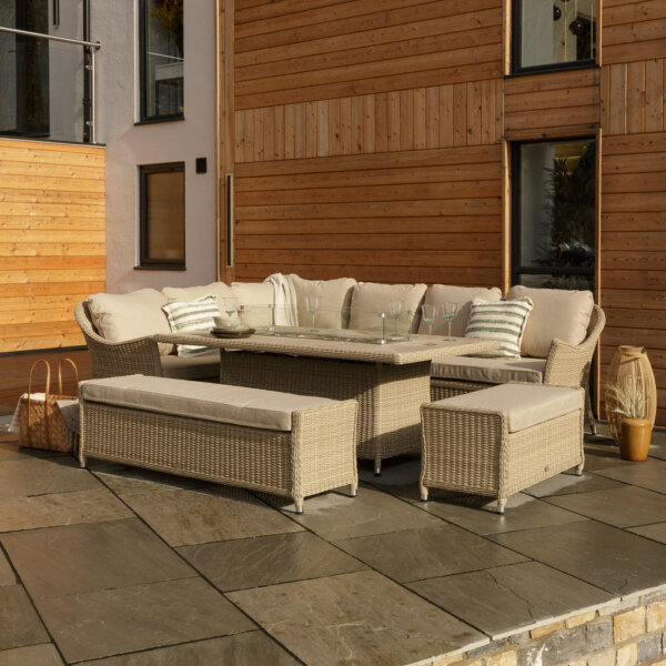 Bramblecrest Monterey Garden Sofa Set With Rectangle Fire Pit Dining Table & 2 Benches – Sandstone 3/4 angle with fire pit off and closer crop
