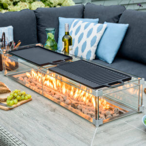 2021 Bramblecrest Double Griddle For Firepit tables with a bottle of wine next to it