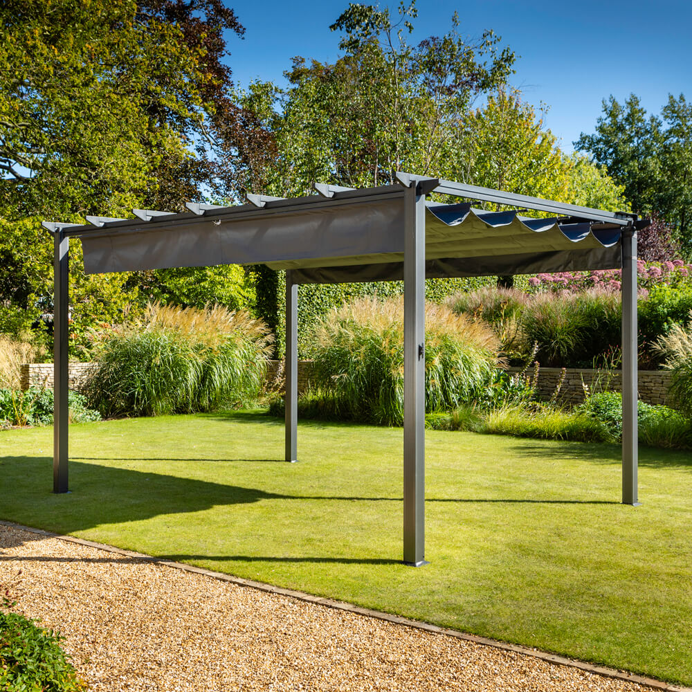 Hartman Roma 3x4m Pergola With Canopy & Shade Curtain on a garden lawn in the sunshine