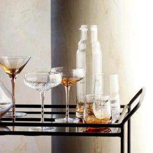 Melbury glasses and carafe on a drinks trolley
