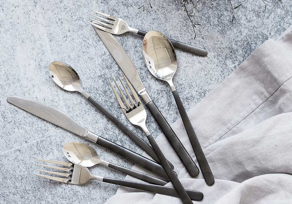 Exmoor cutlery set on a grey table with grey tablecloth