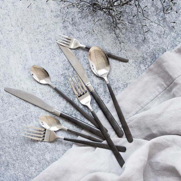 Exmoor cutlery set on a grey table with grey tablecloth