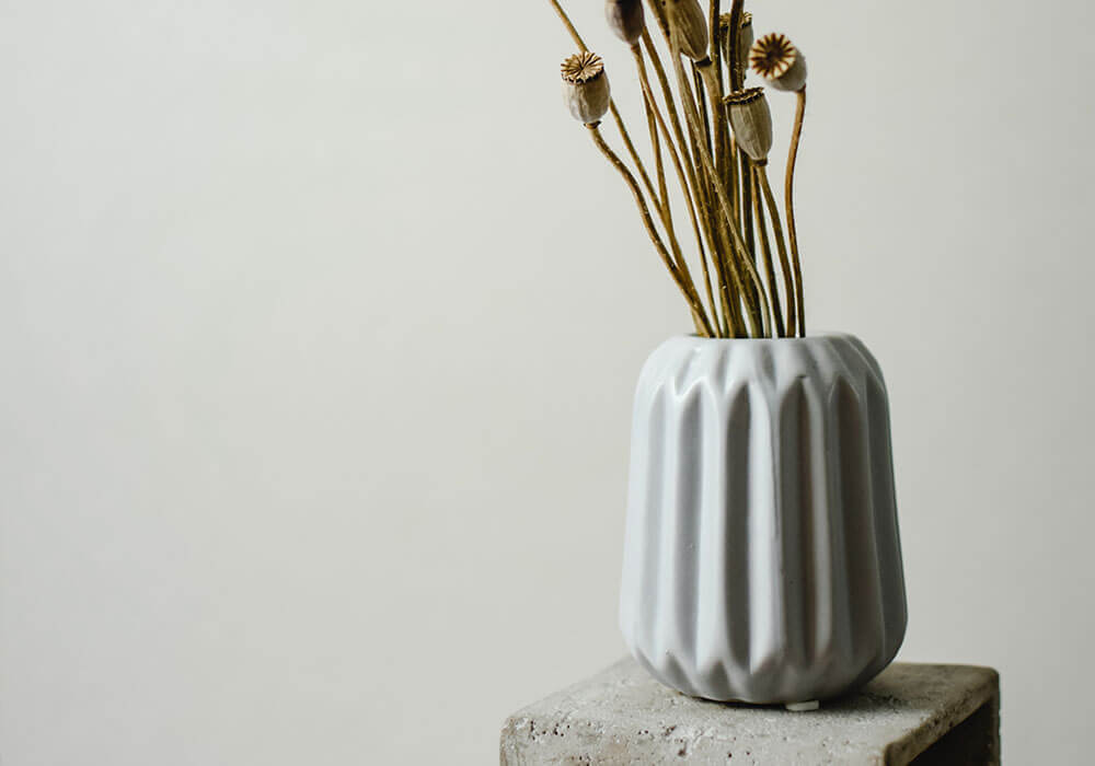 dried flowers in a pastel blue vase