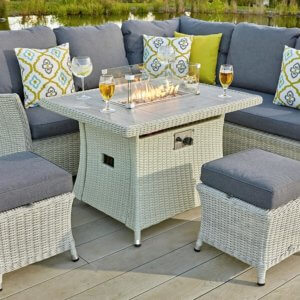 garden table with fire pit with grey cushion seating surrounding
