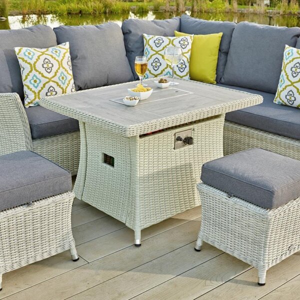 grey ceramic garden table with surrounding garden seating