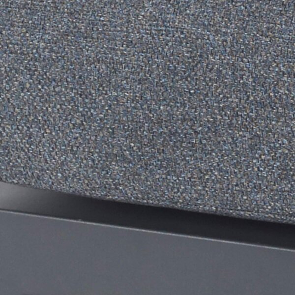 close up swatch of la-rochelle fabric anthratcite and dark grey next to lounger frame