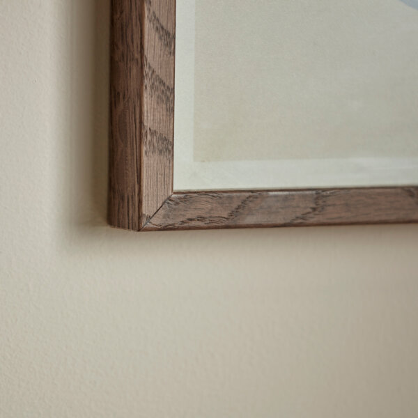 corner segment of multi grain brown wood picture frame