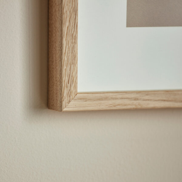 Oak picture frame corner with grain detailing