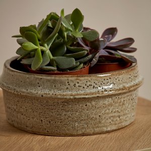 Marton Plant Pot Small Stone on a wooden surface