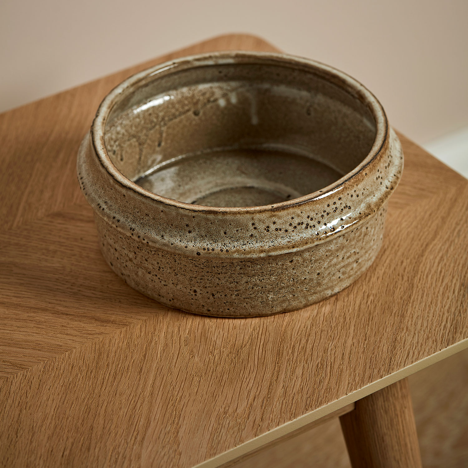 Marton Plant Pot Small Stone on a wooden table