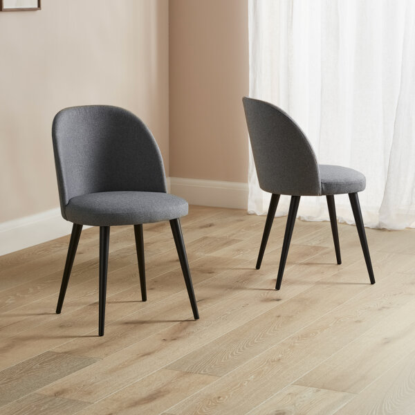 dark grey fabric cupped back dining chair with dark wood legs