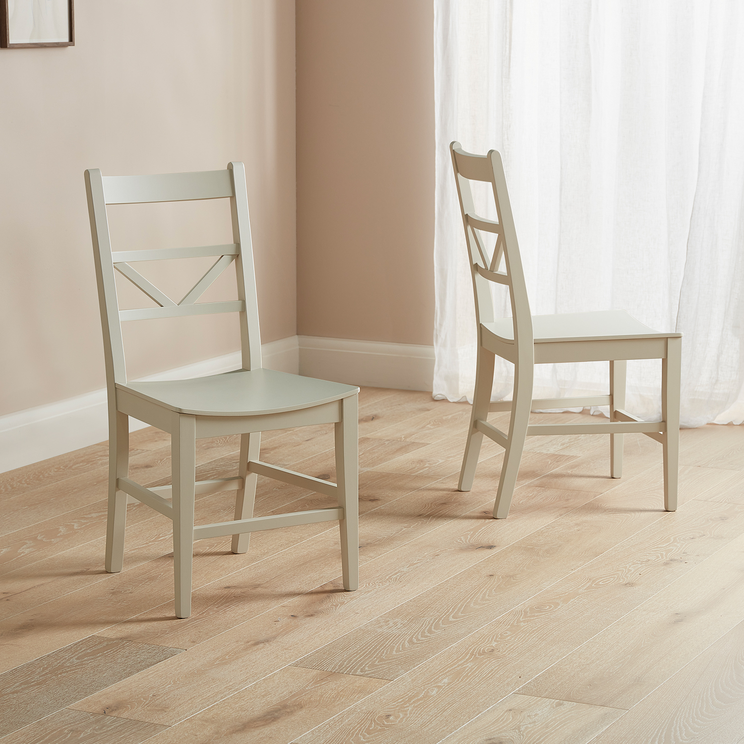 Modern Farmhouse chevron back dining chairs on a wooden floor